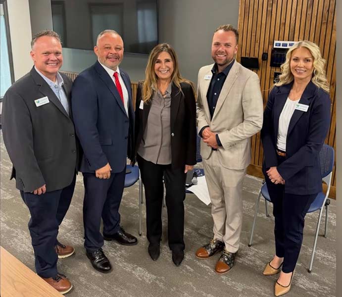 Stephanie Taylor-Thompson, right, with Jeremy Manwaring, left, Monty Burks, second from left, Virginia Seaman, center, and Brennan Summers following Friday's roundtable discussion in Idaho Falls. | Courtesy Stephanie Taylor-Thompson