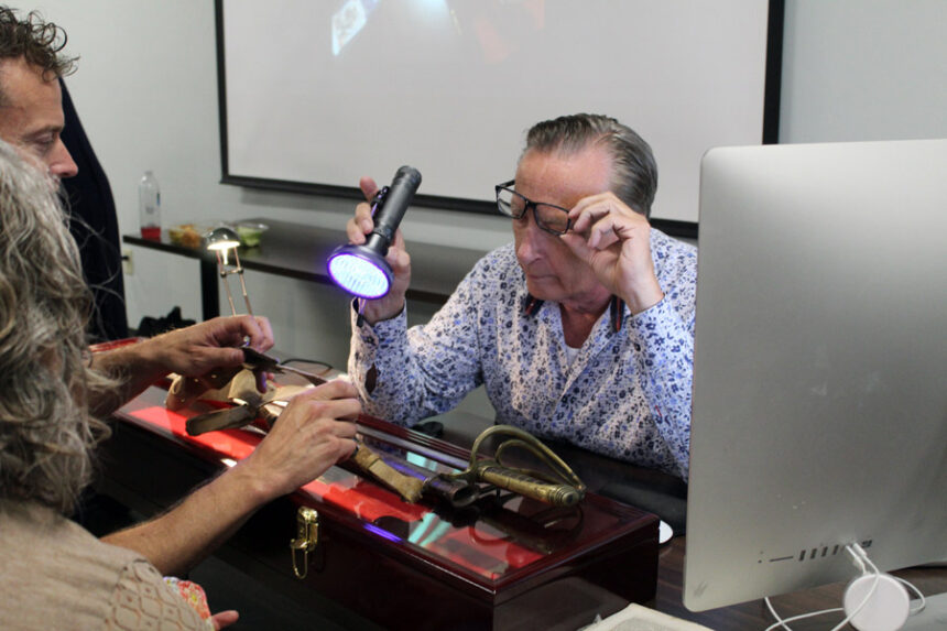 Gordon appraising the sword. | Kaitlyn Hart, EastIdahoNews.com