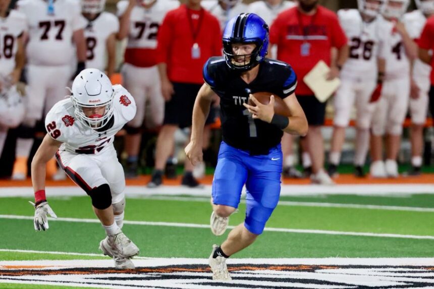 Thunder Ridge quarterback Ryder Portmann runs the ball during Thursday's game. | Kyle Riley, EastIdahoSports.com.