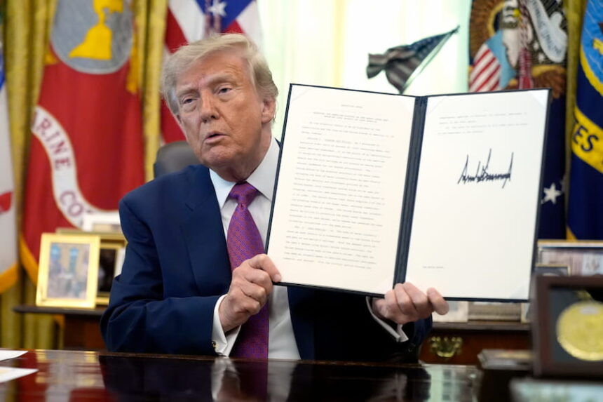 Trump with signature