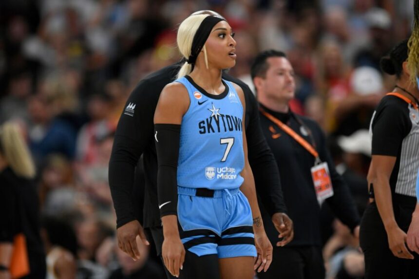 Chicago Sky's DiJonai Carrington walks off the court ejected from the game for committing a flagrant foul against Indiana Fever's Sophie Cunningham during the first half of an WNBA basketball game in Chicago, Saturday, Aug. 8, 2026. (AP Photo/Paul Beaty)