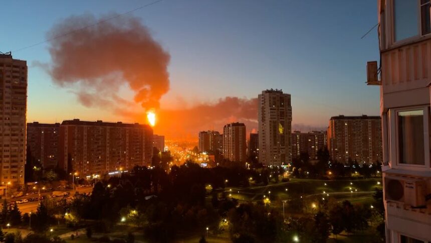 Flame and smoke is seen rising from Moscow's oil refinery in the south east of the city following a largescale Ukrainian drone attack, Sunday, Sept. 20, 2026.