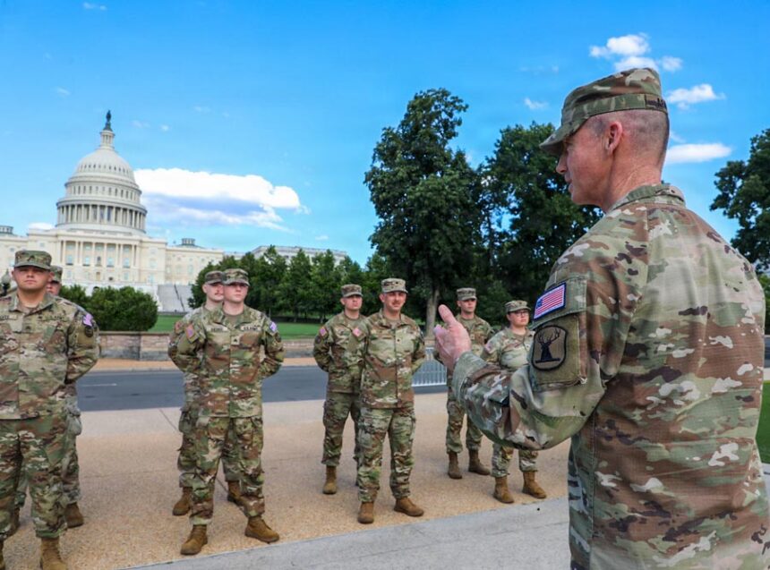U.S. Army Col. Stephen Arnett speaks with members of the Idaho National Guard, assigned to the Joint Task Force-District of Columbia in support of the “D.C. Safe and Beautiful mission,” at the Ulysses S. Grant Memorial in Washington, D.C., on June 16, 2026. | Spc. Keyra Moolenaar, U.S. Army National Guard