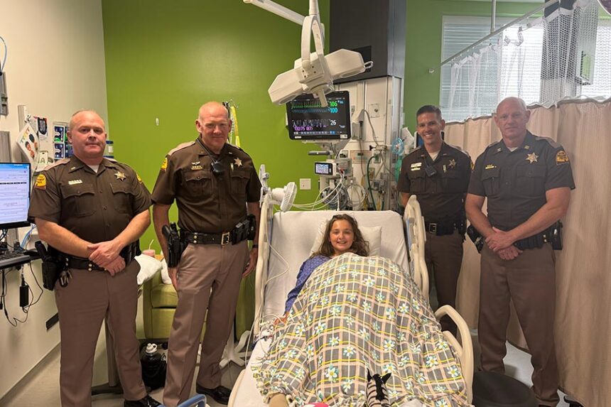 Chloe Hanish at the hospital with her dad, Chase Hanish's Idaho State Police coworkers. | Courtesy of Chase Hanish