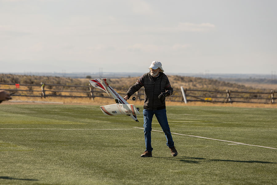 Desert Eagles Club Member Jim Dokos recovering one of the training RC planes during Saturday's event. | Daniel V. Ramirez, EastIdahoNews.com