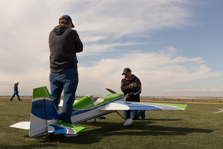 Member of the Desert Eagles Jim William and Mark Harvey helping to start up an Extra 260 RC plane. | Daniel V. Ramirez, EastIdahoNews.com