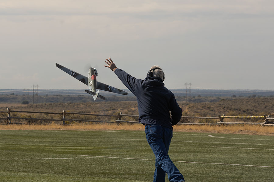 Member of the Desert Eagles Scott Zabriskie helping Emma Jones learn how to fly. | Daniel V. Ramirez, EastIdahoNews.com