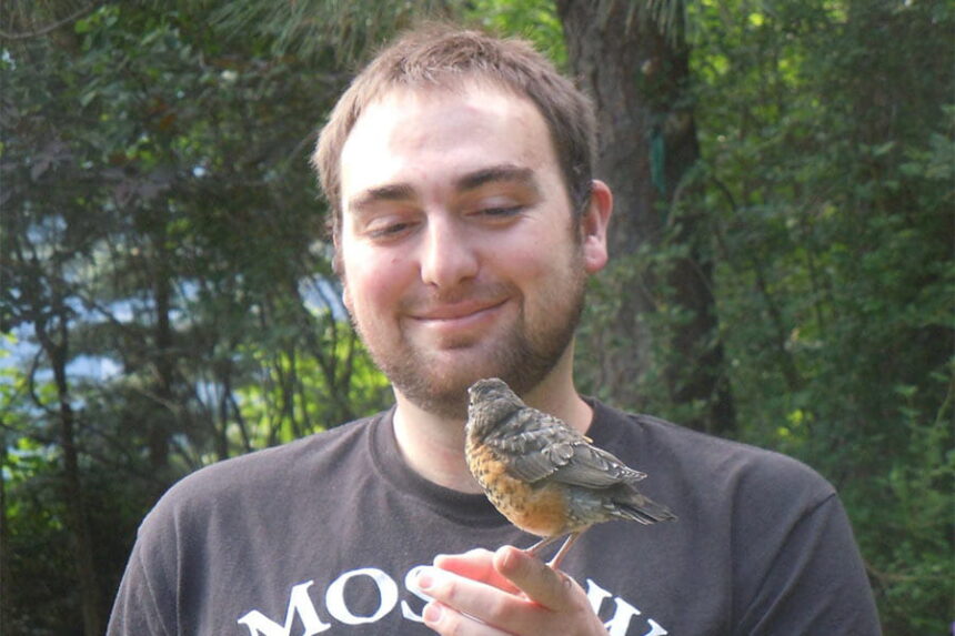 Isaac Berger with bird