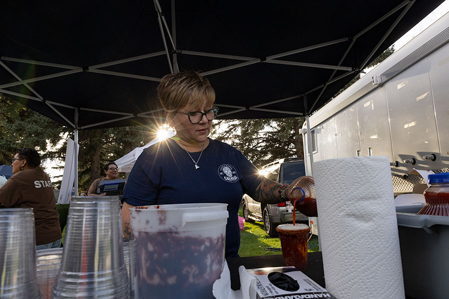 Calakas Tacos and Miches Co-Owner Liliana Sanchez who organized Wednesday's event making michelada, a spicy beer cocktail. | Daniel V. Ramirez, EastIdahoNews.com
