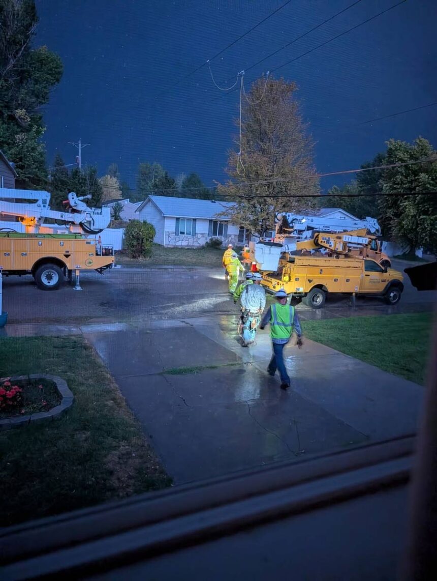 Power crews working to restore power to the neighborhoods during a thunderstorm on Tuesday. | Nikki Tschikof