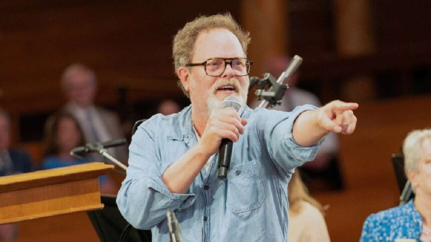 Rainn Wilson looks at choir music during a rehearsal for the Tabernacle Choir last week. He interacted with the choir while working on a documentary about what God means in the modern world. | The Tabernacle Choir, Instagram