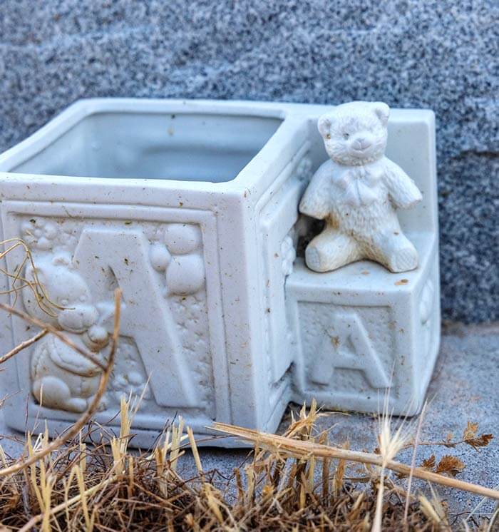 baby blocks on tombstone