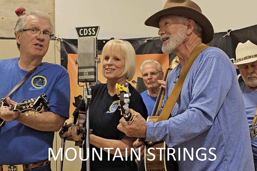 Teresa, center, and Monty, right, during a recent performance with. Mountain Strings | Courtesy Teresa Mortensen