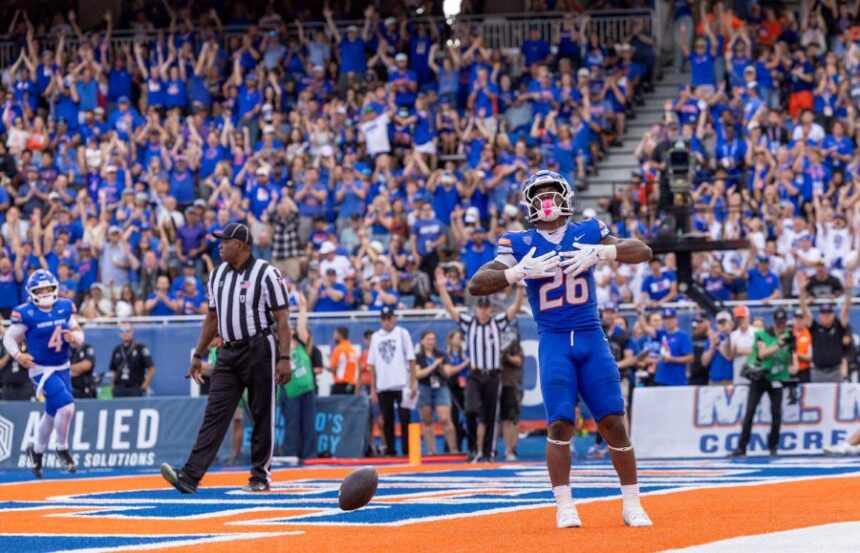 Boise State running back Sire Gaines celebrates his rushing touchdown in the 3rd quarter against Memphis in the Broncos’ home opener at Albertsons Stadium in Boise, Saturday, Sept. 12, 2026. Darin Oswalddoswald@idahostatesman.com
