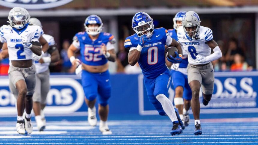 Boise State running back Dylan Riley breaks away from the Memphis defense for a big gain in the 2nd quarter at Albertsons Stadium in Boise, Saturday, Sept. 12, 2026. Darin Oswalddoswald@idahostatesman.com
