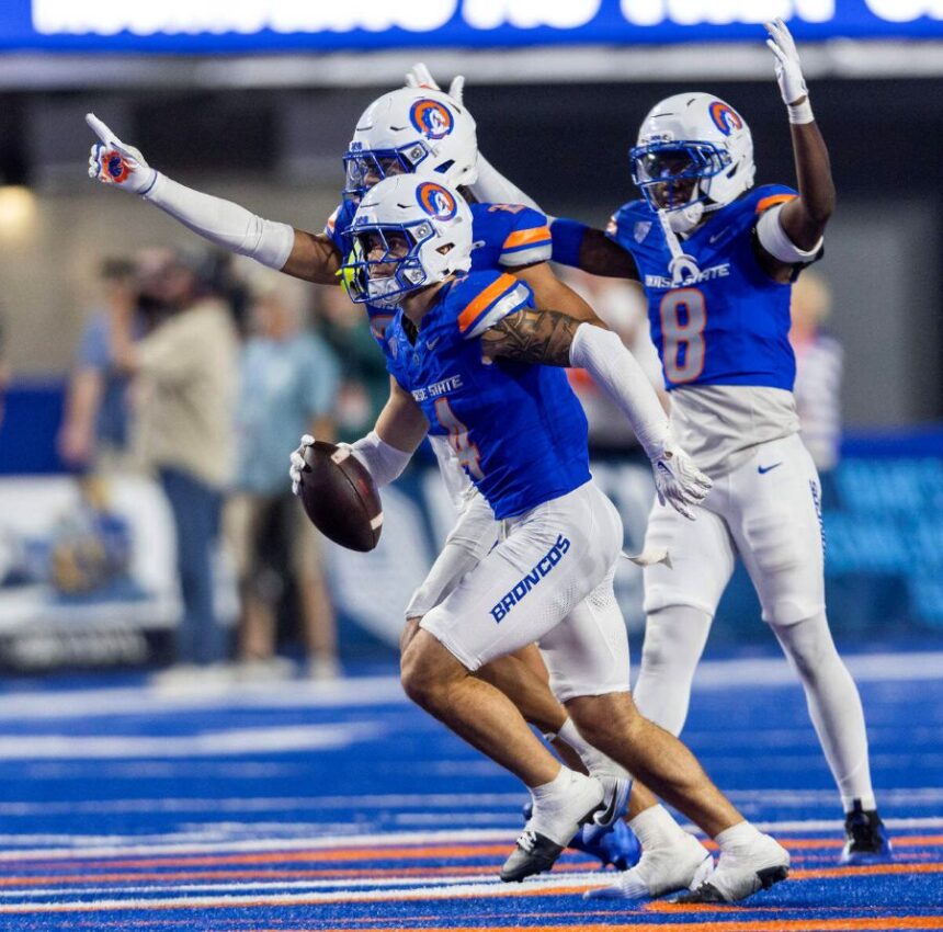 Boise State defensive back Travis Anderson begins celebrating his game-clinching interception against South Dakota at Albertsons Stadium in Boise, Saturday, Sept. 19, 2026. Darin Oswalddoswald@idahostatesman.com