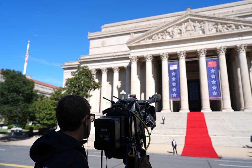 A CNN camera sets up before President Donald Trump, first lady Melania Trump, China's President Xi Jinping and his wife Peng Liyuan arrive at the National Archives Museum, Friday, Sept. 25, 2026, in Washington. (AP Photo/Julia Demaree Nikhinson)