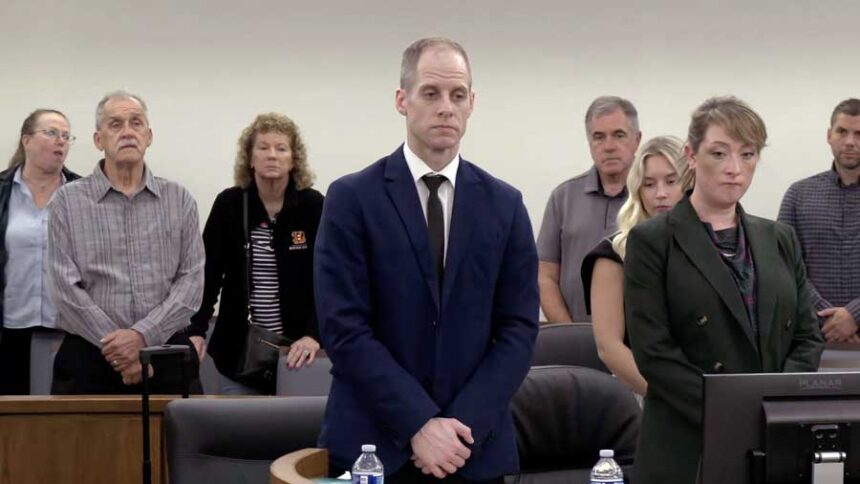 Caleb Flynn appears in court, on Friday, Sept. 18, 2026, at Miami County Courthouse in Troy, Ohio, as he stands trial on charges connected to the killing of his wife, Ashley. (Still from pool camera footage)