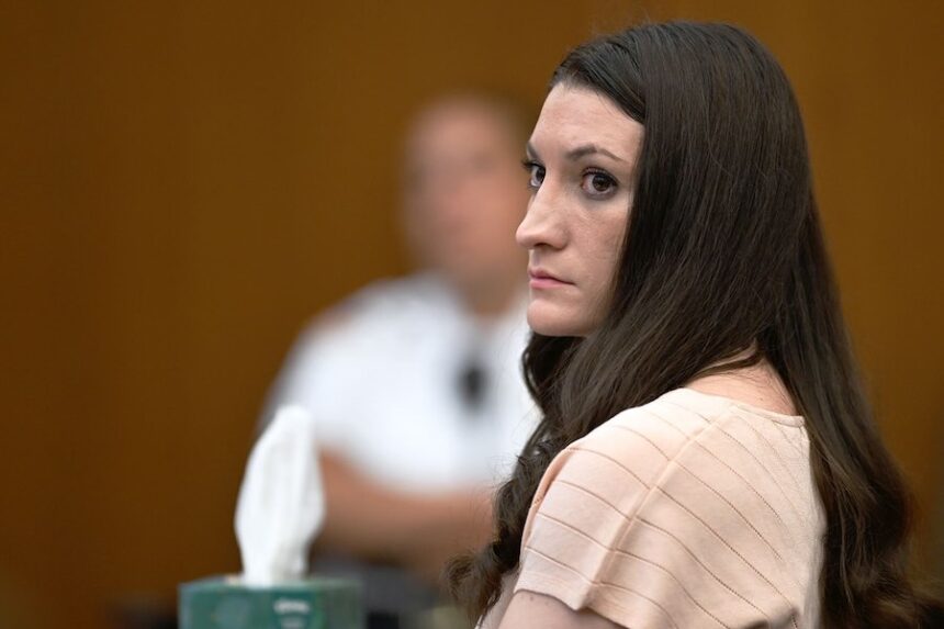 Lindsay Clancy looks on from the defense table in a Plymouth, Mass., courtroom on Aug. 13, 2026, during her triple-murder trial.
