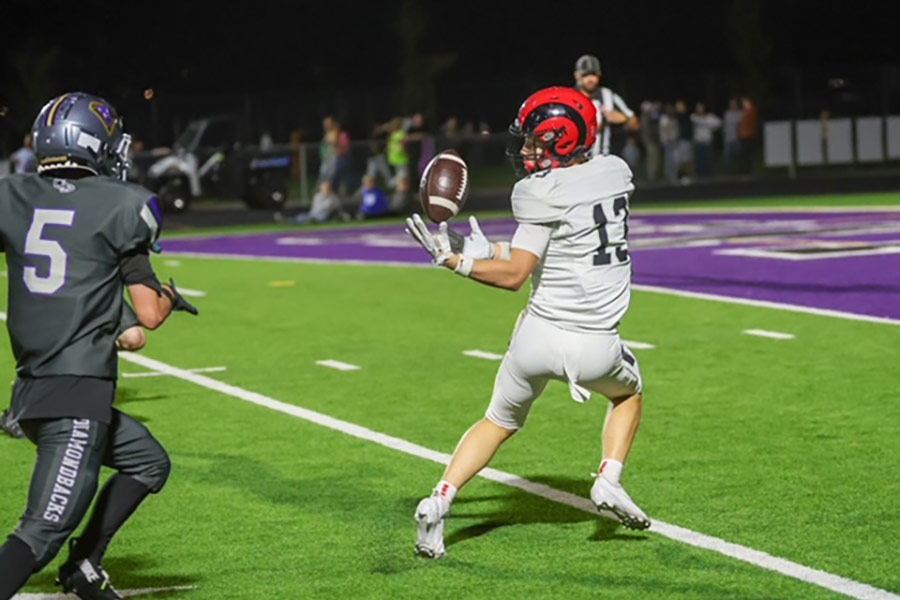 Highland Kellan Tingey brings in the juggling touchdown catch