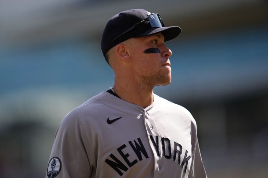 New York Yankees' Aaron Judge walks back to the dugout after the bottom of the fourth inning of a baseball game against the Minnesota Twins, Wednesday, Sept. 16, 2026, in Minneapolis. (AP Photo/Abbie Parr)