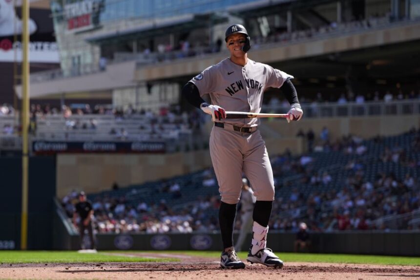 New York Yankees' Aaron Judge reacts after striking out during the third inning of a baseball game against the Minnesota Twins, Wednesday, Sept. 16, 2026, in Minneapolis. (AP Photo/Abbie Parr)