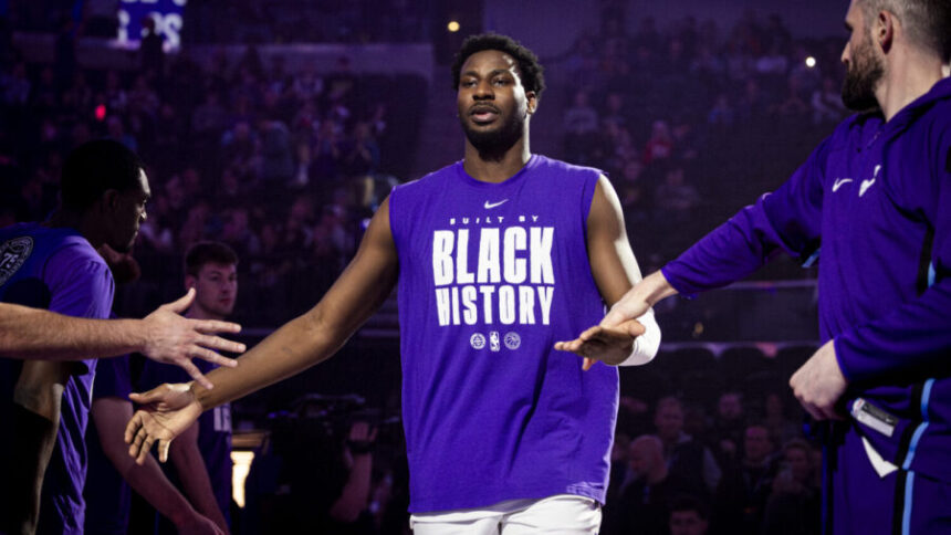 Utah Jazz forward Jaren Jackson Jr. slaps hands with his teammates as his name is announced with the rest of the Jazz’s starting lineup before an NBA game against the Sacramento Kings held at the Delta Center in Salt Lake City on Wednesday, Feb. 11, 2026. (Photo courtesy of Isaac Hale, Deseret News)