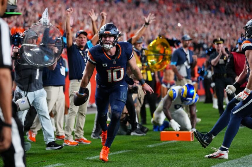 Denver Broncos quarterback Bo Nix reacts after a play against the Los Angeles Rams during the second half of an NFL football game Sunday, Sept. 27, 2026, in Denver. (AP Photo/Jack Dempsey)