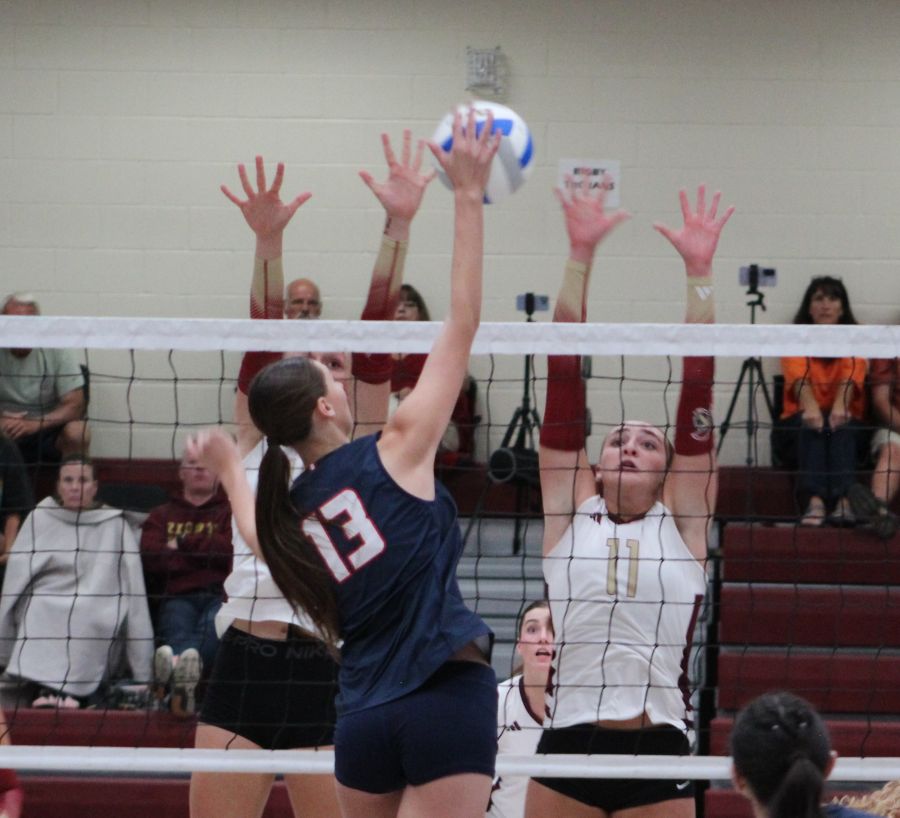 Giada Bertagnolli leads the Rigby block against Pocatello's Taylee Silcock. | Allan Steele, EastIdahoSports.com.
