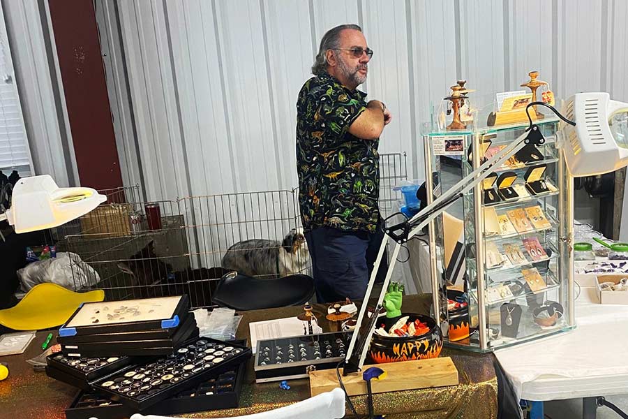 John Nickolas from Idaho Falls will be showing and offering Spencer fire opal jewelry and specimens at the sale next Saturday. | Bill Schiess, EastIdahoNews.com