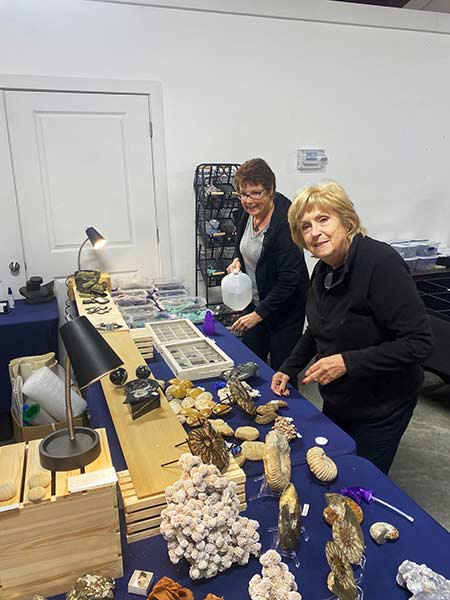 Kathy Moedl and her sister set up their booth at last year's sale. She will be offering rare specimens from around the world. | Bill Schiess, EastIdahoNews.com