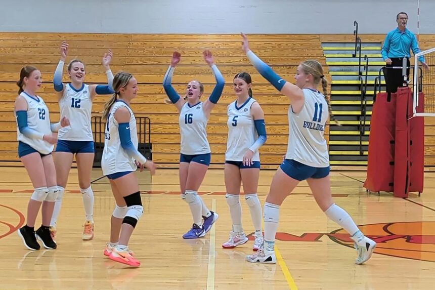 Rockland volleyball celebrates ace from sophomore Raylee Vader
