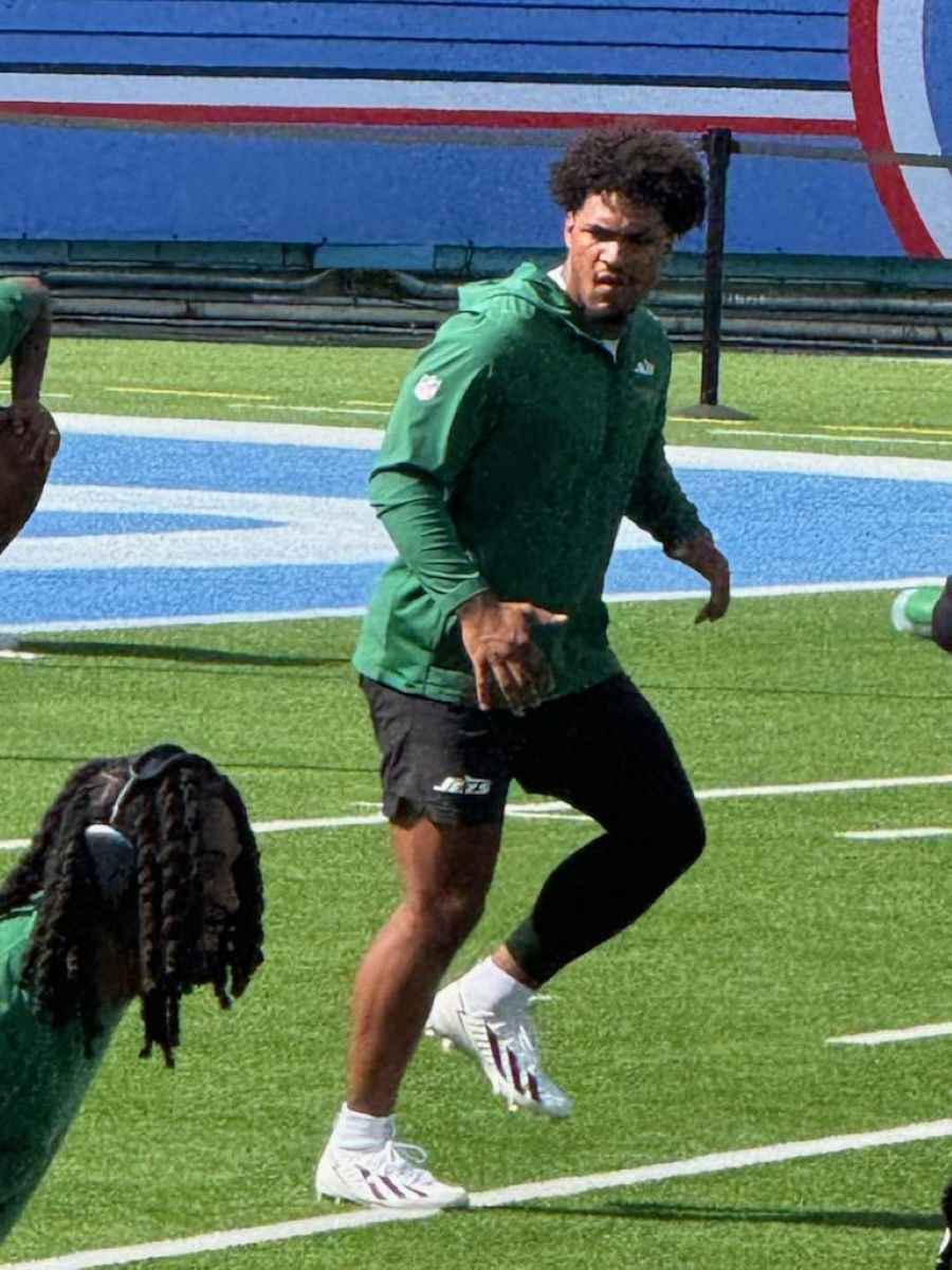 Kenyon Sadiq warms up prior to last week's game. | Courtesy photo.
