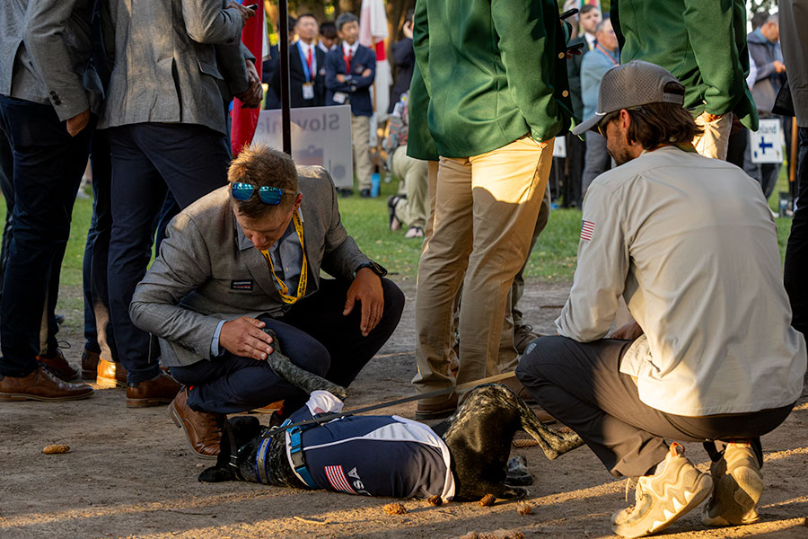 Cody Burgdorff of Lafayette, Colorado representing the U.S. in the World Fly Fishing Tournament with his dog, Dakota, interacting with an angler from Slovenia. | Daniel V. Ramirez, EastIdahoNews.com
