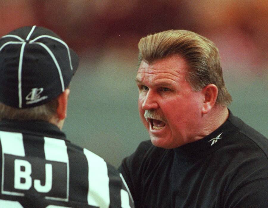 FILE - New Orleans Saints head coach Mike Ditka, right, yells at offical Bill Lovett during he first half of the Saints 20-3 loss to the Falcons in Atlanta, Sunday, Nov. 23, 1997.