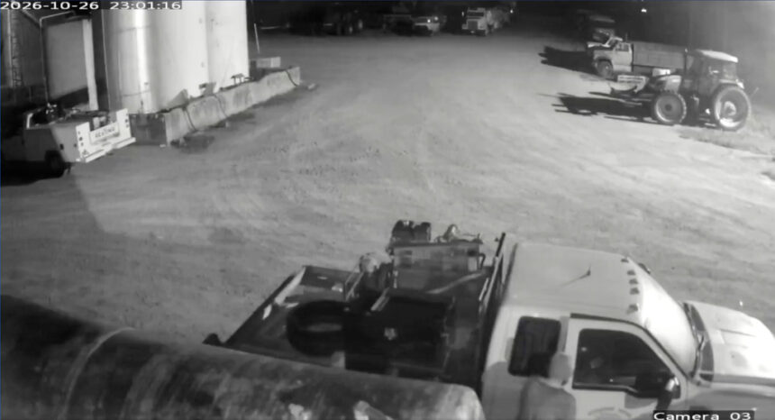 This image from security video provided by John Lindamood shows escaped inmate Jacob Allen Morley, bottom right, stealing a white Ford F-350 from the Lindamood Planting Company early Monday, Oct. 26, 2026, in Lake County, Tenn. (John Lindamood via AP)