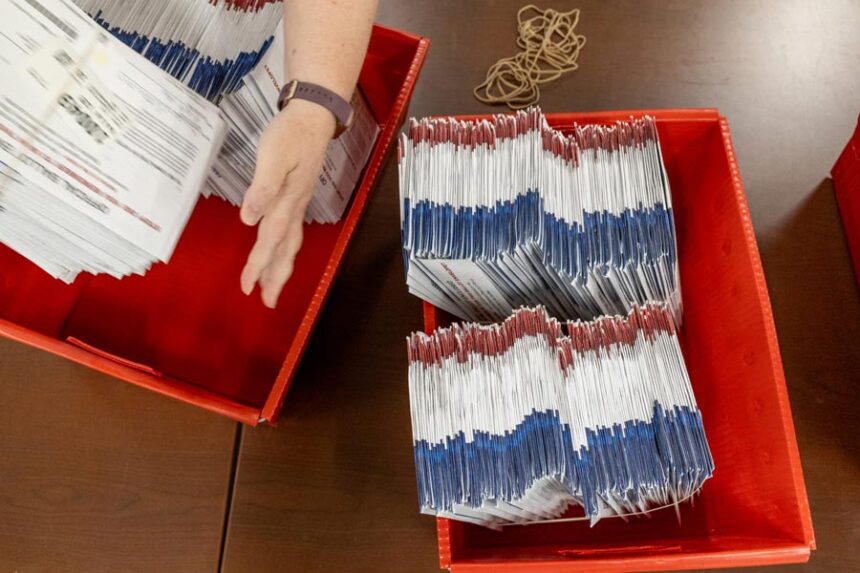 Ada County election workers sort hundreds of absentee ballots for the 2026 general election on Oct. 1, 2026. | Kyle Pfannenstiel, Idaho Capital Sun