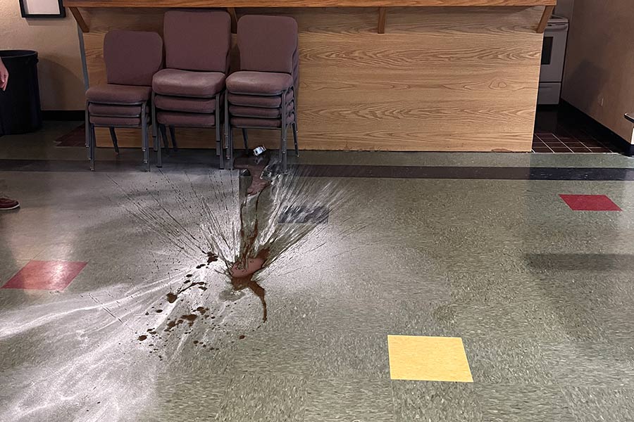 A food item thrown on a floor.