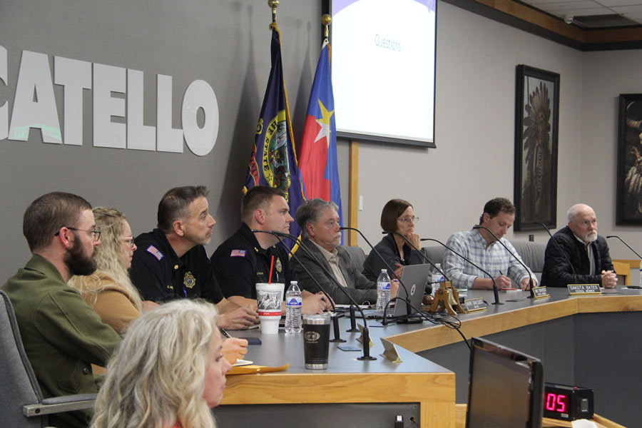 The mayor, police leadership and the city council listen during the public comment portion of the meeting.