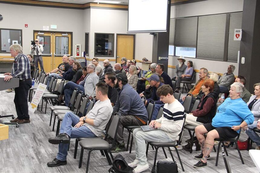 Stephen Adams speaks during the Flock town hall.