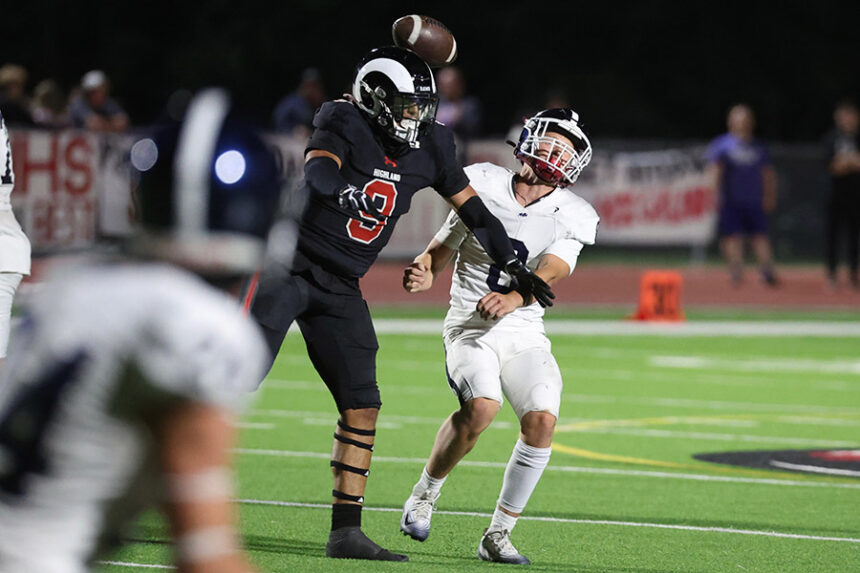 Highland Jaxson Collard pressures Pocatello Rhev Stucki during the Rams' 17-8 Black and Blue Bowl win.