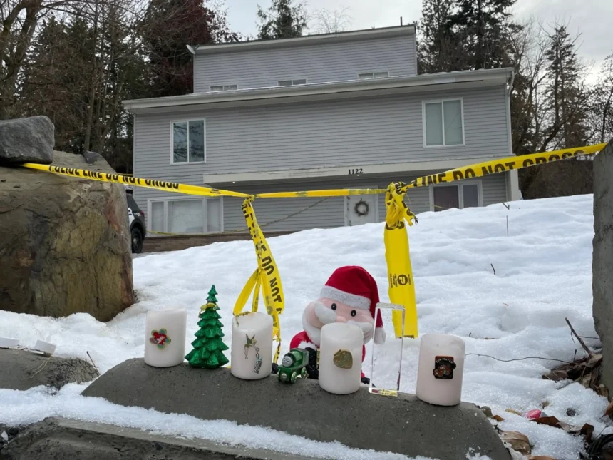 Candles and Christmas decorations are displayed in December 2022 outside the King Road house in Moscow where four University of Idaho students were killed. | Garrett Cabeza, The Spokesman-Review