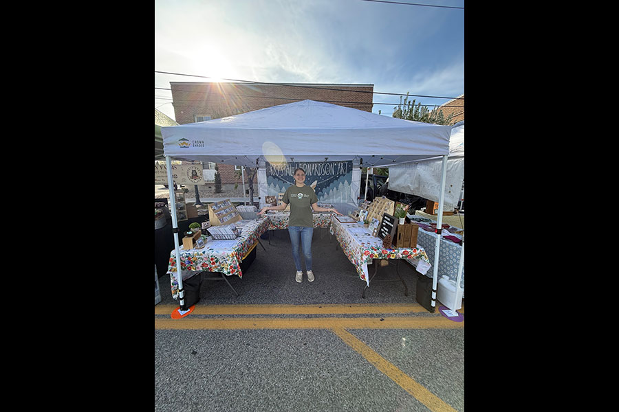 Krystal Leonardson at the Idaho Falls Farmers Market selling her artwork and talking with community members. | Courtesy Krystal Leonardson