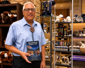 Larry Murillo with book