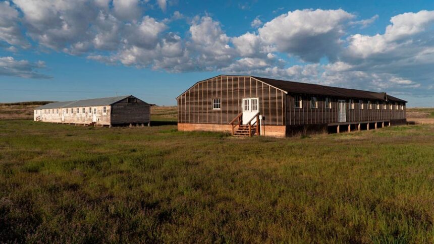 The Minidoka National Historic Site in southern Idaho offers 1.6 miles of gravel walking trails. Visitors may explore the site and the exteriors of historic structures at their own pace. Educational exhibits are placed along the trail to provide information. (Photo courtesy of the National Park Service)