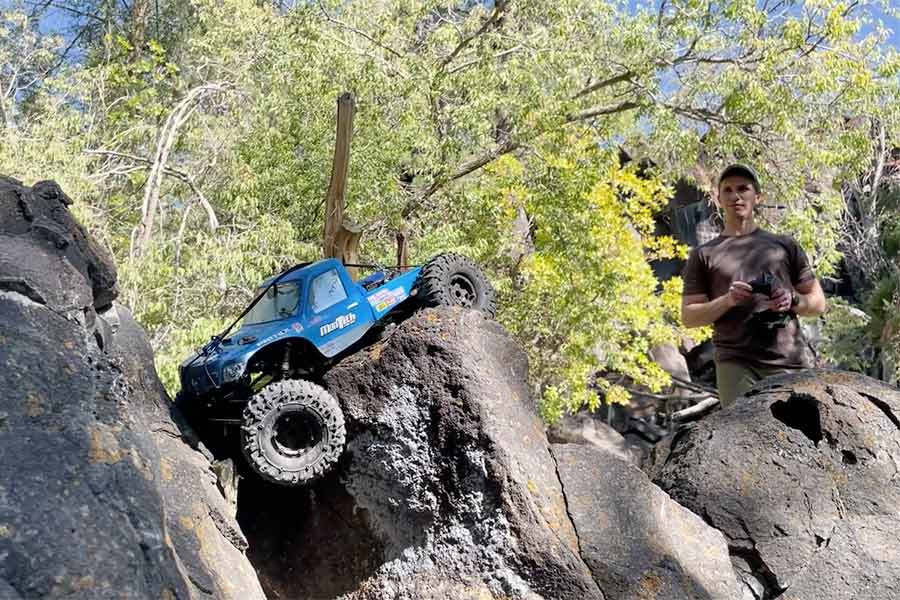 Bryce Shurtliff drives his crawler on some rocks at Lower Ross Park.