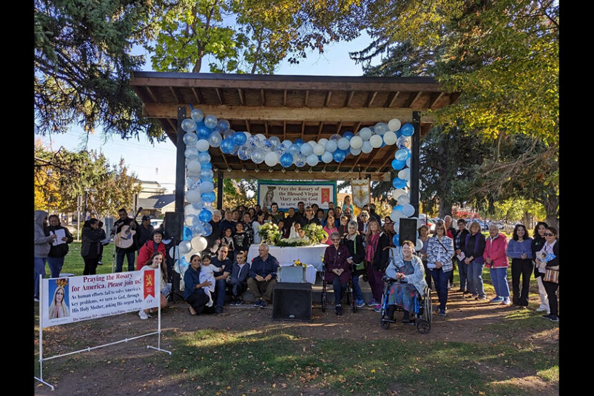 Dozens of local community members at the Snake River Greenbelt Band Stage at last year's Rosary Rally hosted by local Catholics. | Courtesy Carlos Estrada