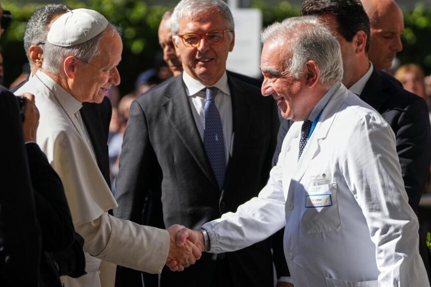 Medical Director Andrea Cambieri, right, greets Pope Leo XIV as he arrives at the Agostino Gemelli Polyclinic in Rome on Tuesday, Oct. 13, 2026, where doctors expect to operate to remove a lung nodule. | Gregorio Borgia, Associated Press