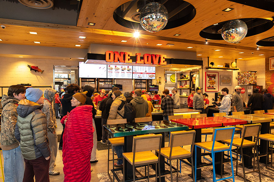 Part of the grand opening for Raising Cane's new location in Idaho Falls, the first 100 got a branded trucker hat and a free box combo card. | Daniel V. Ramirez, EastIdahoNews.com