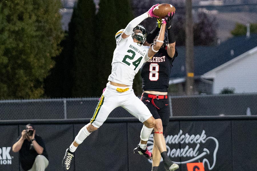 bonneville's Logan Arnold hillcrest's Gavin Lamph battle for possession